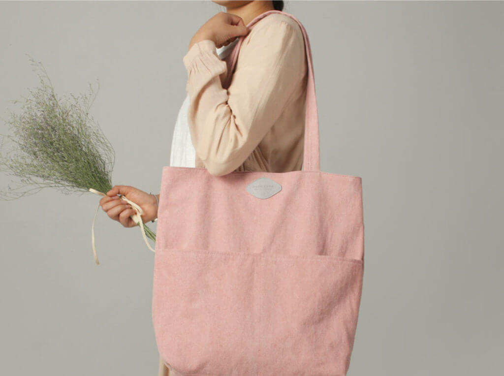 Production timeline for pink tote bag with external pocker
